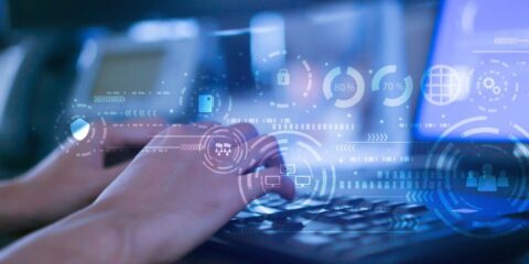 close up programmer man hand typing on keyboard laptop for register data system or access password at dark operation room , cyber security concept